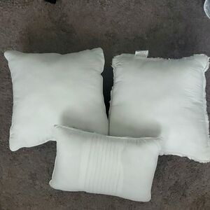 Set of 3 white throw pillows